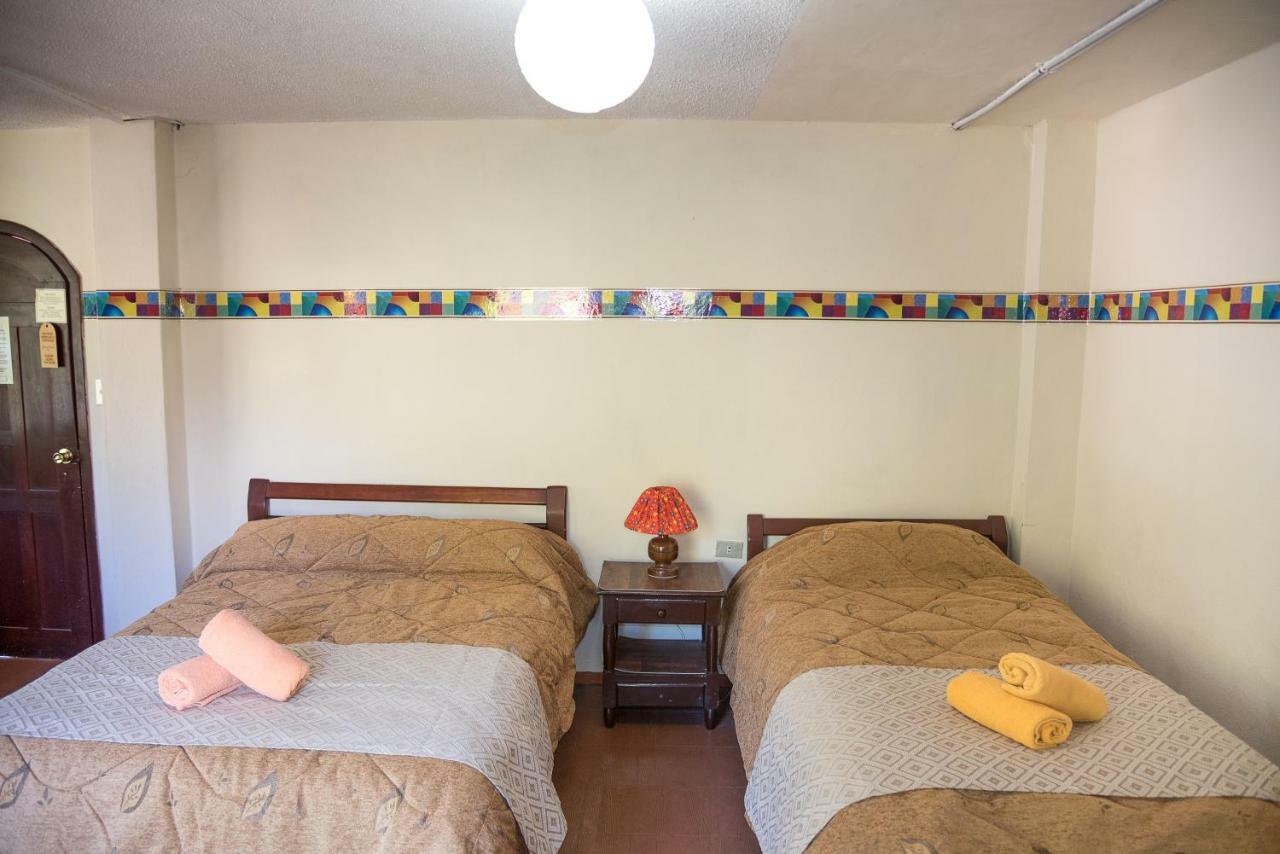 Hotel Flor De Oriente Baños Oda fotoğraf